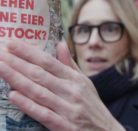 SUSANNE LIEDTKE putting a sticker